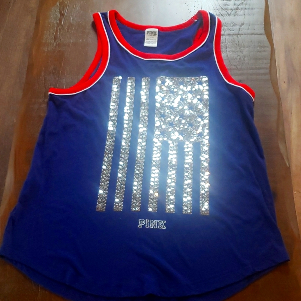 Misses patriotic tank top.  This was never worn but the tags were removed.